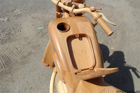 detailed carved wooden motorcycle