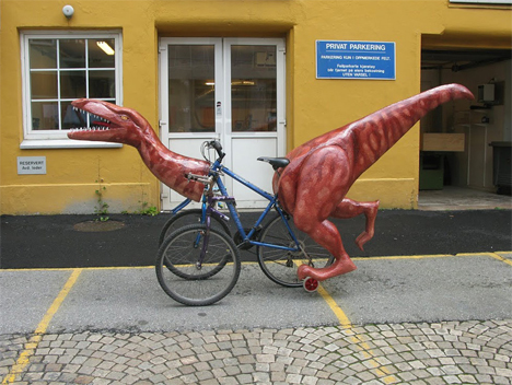 three wheeled dinosaur bike