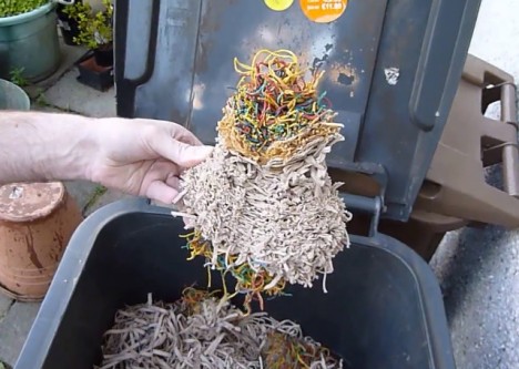 cutting a giant rubber band ball