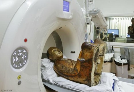 mummified monk inside statue