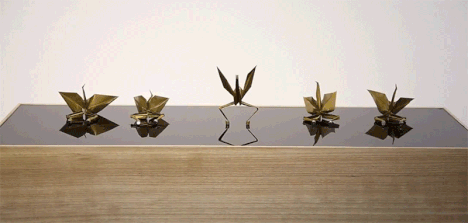 animated dancing paper cranes
