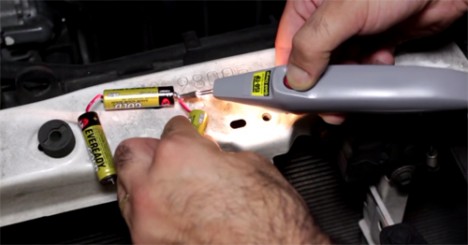 jump starting a car with batteries