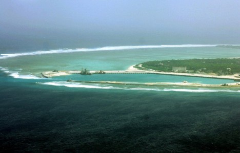 (FILES) This file aerial view taken on July 27, 2012 shows part of the city of Sansha on the island of Yongxing, also known as Woody island in the disputed Paracel chain, which China now considers part of Hainan province.  China has deployed surface-to-air missiles on the disputed island in the South China Sea, Taiwan said on February 17, 2016, as Beijing insisted it had a right to build "self-defence" systems in the strategic region.  Taiwan's defence ministry confirmed the existence of the facility after Fox News reported that missile launchers had arrived on Woody Island, part of the Paracels chain, in the past week.           CHINA OUT      AFP PHOTO / FILES / AFP / STR